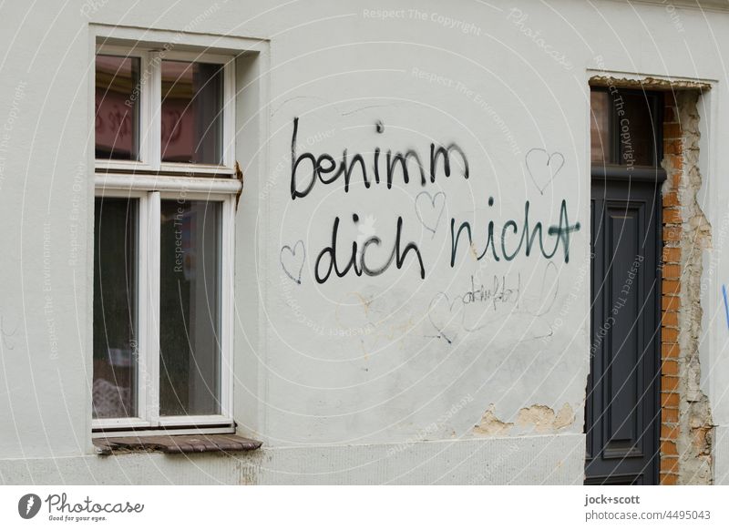 don't behave 💕 Characters Remark Heart (symbol) Street art Romance Handwriting German Facade Window Front door Perspective Demand Brandenburg an der Havel