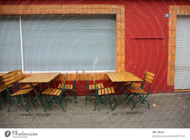 rest day Gastronomy Restaurant Table Seating Chair Empty Sidewalk café Closed Folding chair chairs Terrace Café Snack bar roller shutter outside gastronomy
