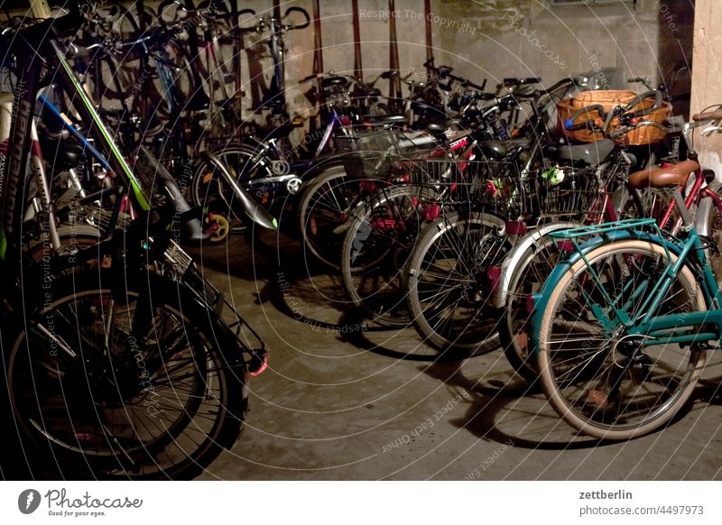 Bicycles in the basement parking facility Storeroom bicycle cellar Bicycle lot Closing time Cellar Parking Parking garage Wheel dwell Apartment Building
