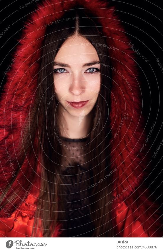 beautiful brunette with blue eyes wearing red faux fur hood book cover hooded hoodie cape fake fur fantasy Russian woman girl portrait blue-eyed pretty