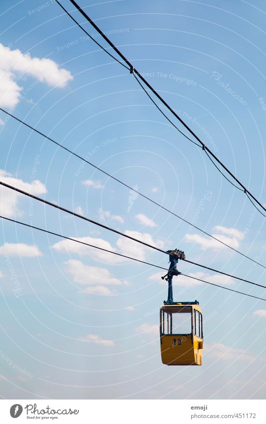 flashy yellowish blue Sky Sky only Means of transport Passenger traffic Aviation Cable car Blue Yellow Tourism Colour photo Exterior shot Aerial photograph