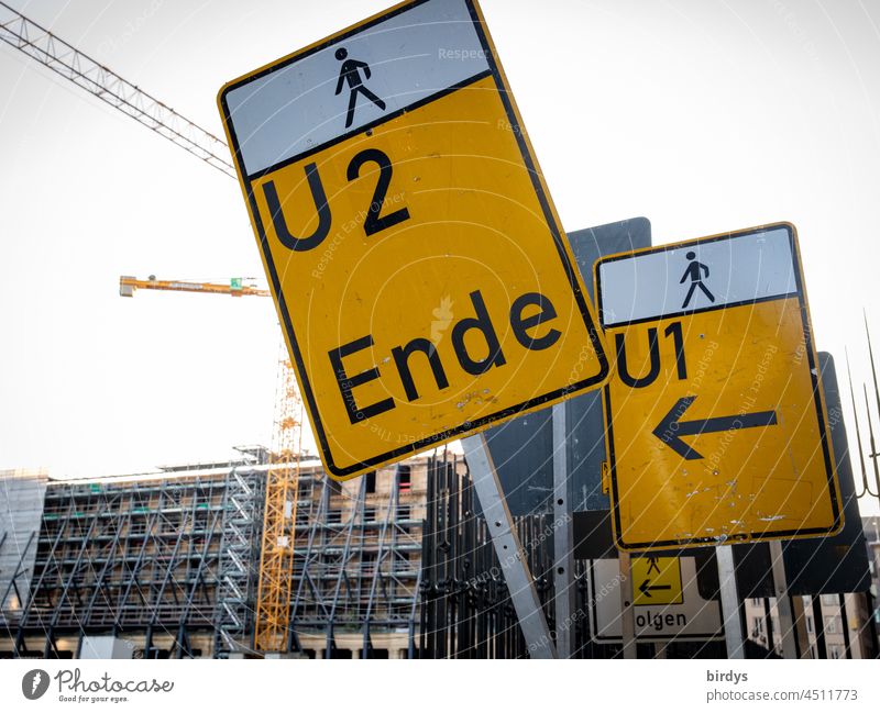 Signs with pedestrian diversions and many construction sites in urban areas. Urban planning ,City Pedestrian walkways Detour signs Town Construction site