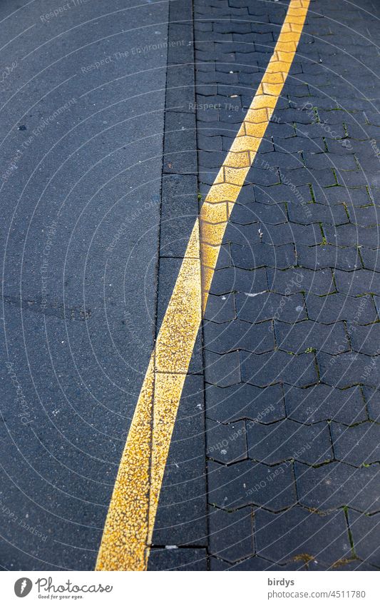 yellow line which runs over different road surfaces Line Street Asphalt bone stones demarcation Traffic infrastructure curvy Lane markings Curve Pavement