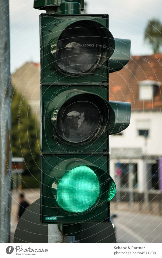 the traffic lights are green Traffic light Green Road sign forbidden stop Transport Road traffic Traffic infrastructure Town Colour photo Exterior shot Motoring