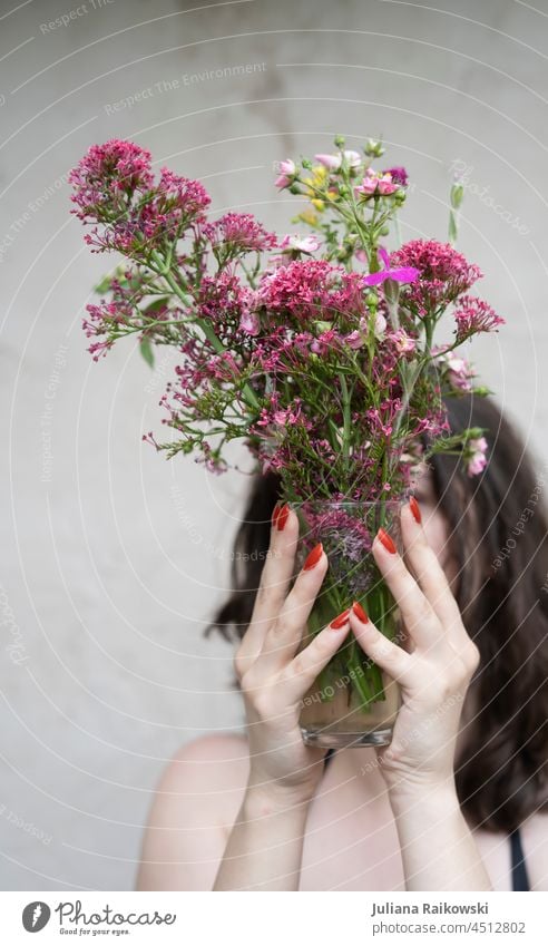 Woman holds bouquet in front of her face Bouquet Flower Spring pretty Plant Blossom Colour photo Blossoming Day Decoration Pink Summer Nature pink feminine cute