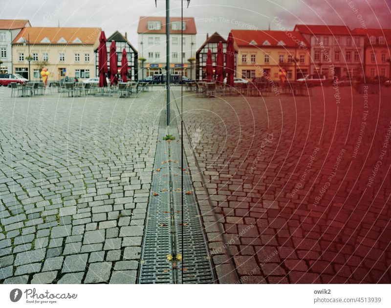 redshift Reflection Mirror image Town Window pane Glass wall houses Old town Ribnitz-Damgarten downtown Paving stone Housefront roofs Exterior shot Facade