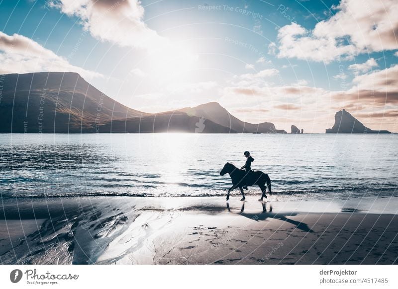 Beach with rider with view of the Faroe Islands Gásadalur Surf curt Slope Territory Sun Dismissive cold season Denmark Experiencing nature Adventure Majestic