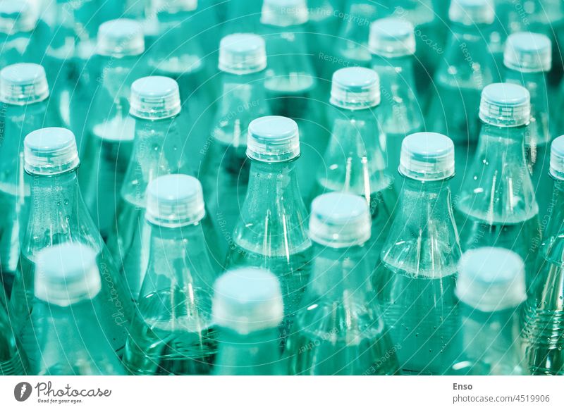 Mineral drinking water in green plastic bottles in the grocery store, Moscow, 28 Oct 2021 mineral nature mountain clean healthy fresh care pure closeup natural