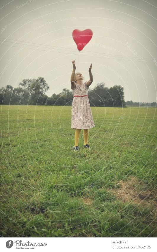 hearts flieeeeeg Child Girl young girl feminine Infancy Body Arm 8 - 13 years Environment Nature Landscape Sky Summer Climate Grass Bushes Uniqueness Green Red