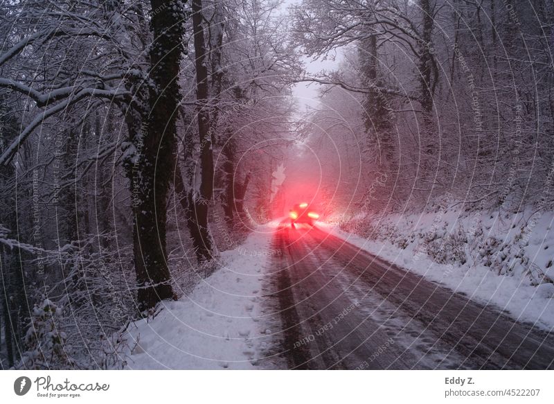 Car in winter on snow covered road. Bad road with snow and ice slippery. Winter Traffic lane Street Snow Cold Weather Nature Landscape Frozen Dangerous