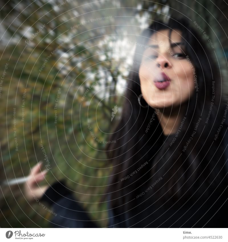 Estila Woman Smoking Feminine Long-haired Dark-haired Forest Tree Smoke exhale stop Cigarette motion blur