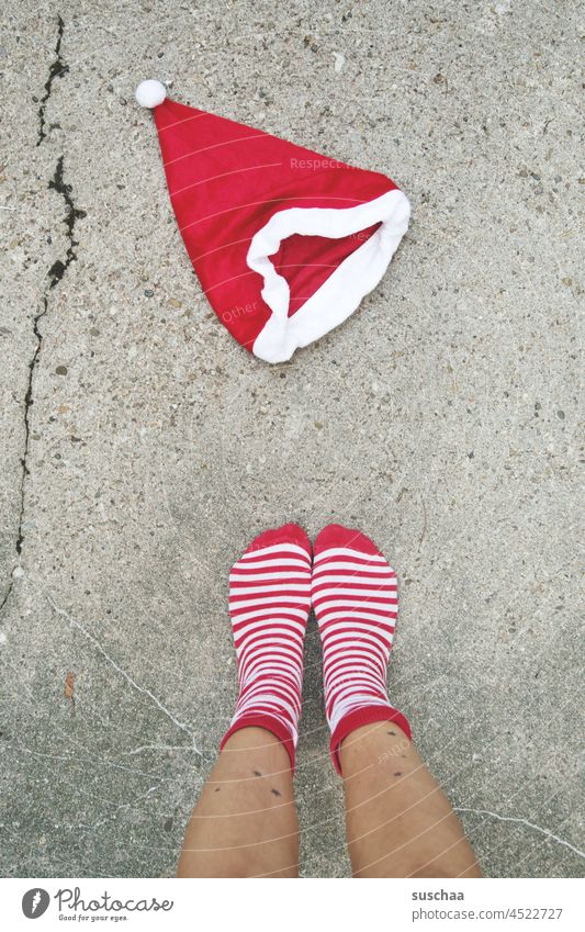 santa claus hat & feet in red striped socks Santa Claus hat Christmas & Advent Feasts & Celebrations Decoration Red Christmas decoration Tradition Kitsch