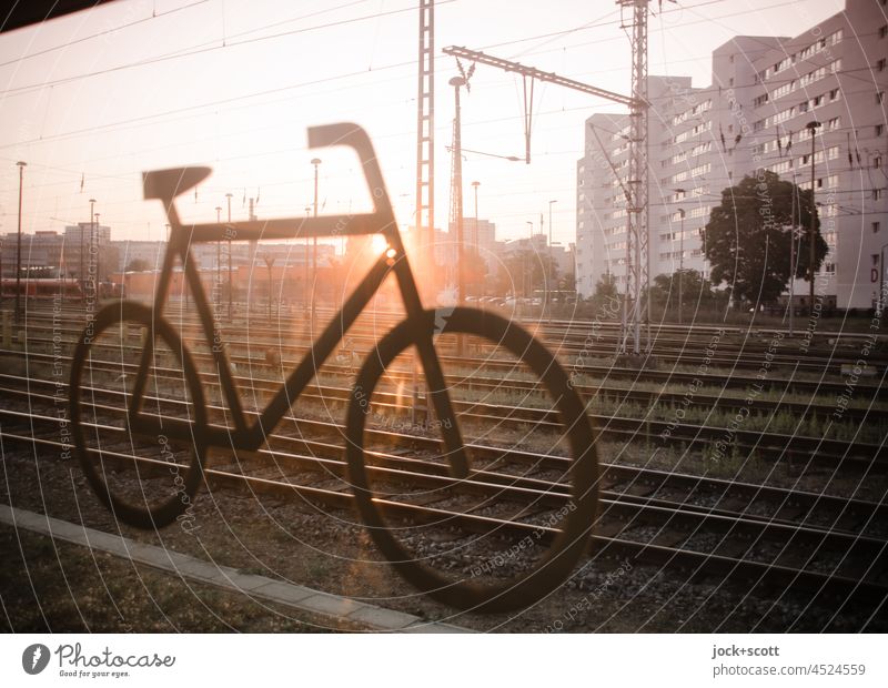 Bicycle transport on regional rail services with the last rays of sunshine of the day Pictogram Signs and labeling Traffic infrastructure Regional railroad