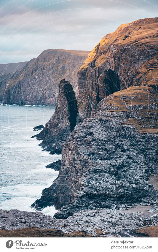 Rocks of Bøsdalafossur with view of the Faroe Islands Surf curt Slope Territory Sun Dismissive cold season Denmark Experiencing nature Adventure Majestic