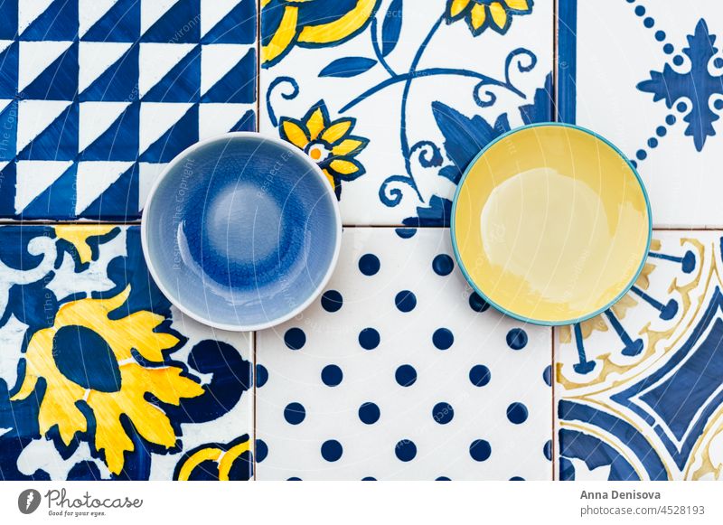 Plates on tile background plate ceramic Portuguese tiles blue Azulejo top view food table white empty tilework painted cutlery dish traditional clean blank