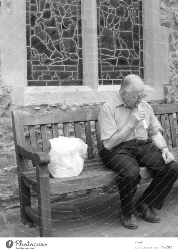 on the church bench Senior citizen England Still Life Calm Refreshment Man Male senior Bench Black & white photo rye Ice