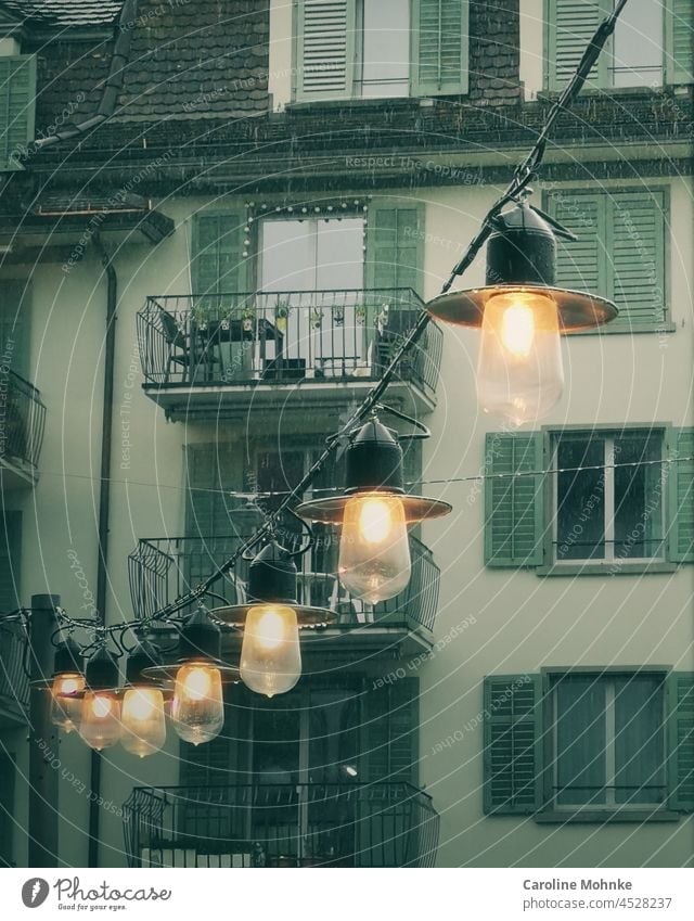 Shining lamps defy the pouring rainy weather Rainy weather Light House (Residential Structure) houses Wet Bad weather Weather Water Exterior shot Drops of water