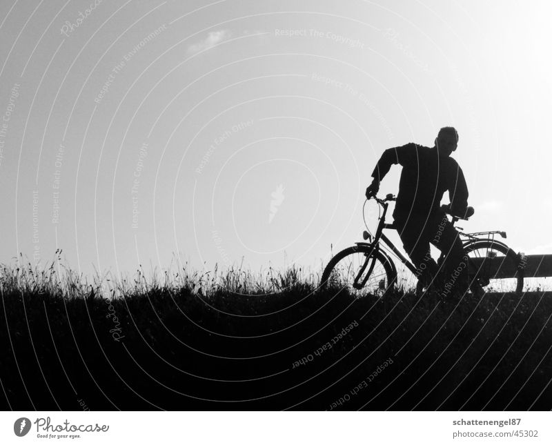 Baltic Sea bike tour Clouds Bicycle Man Black Gray scale value Vacation & Travel Twilight Sun
