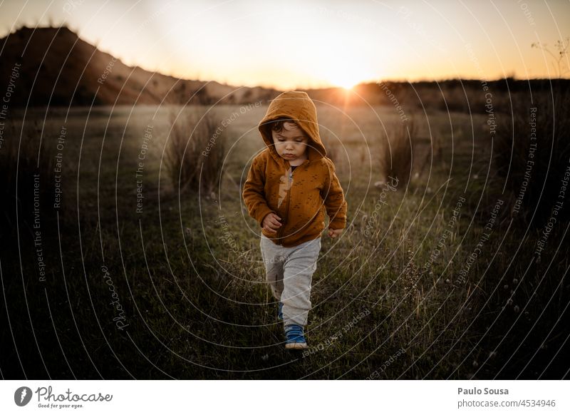 Child walking outdoors childhood Boy (child) 1 - 3 years Caucasian Portrait photograph Authentic one person Leisure and hobbies Joy Happy Human being Lifestyle