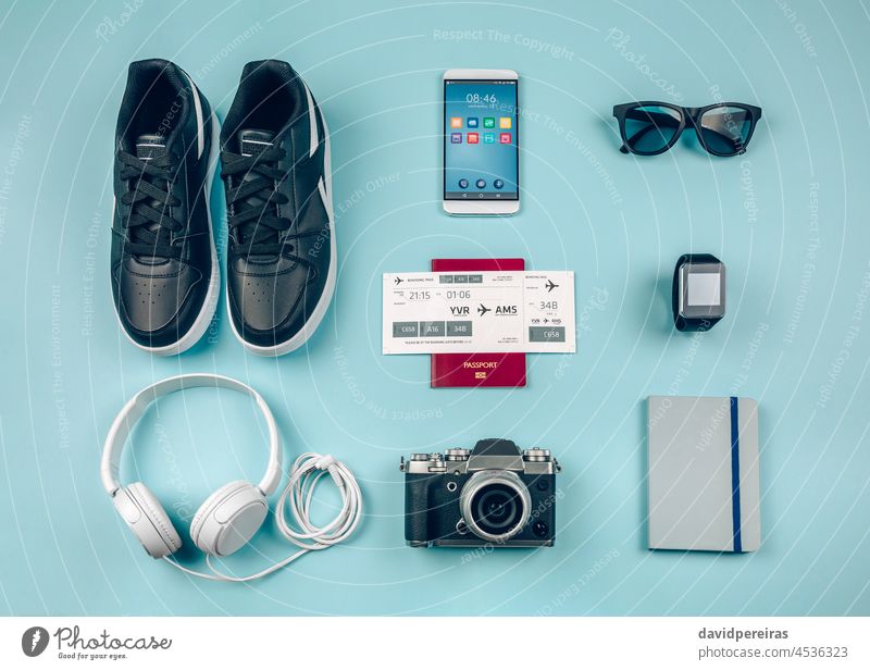 Set with urban vacation accessories city holiday background set still life nobody traveler headphones camera notebook smartwatch sneakers tourism passport