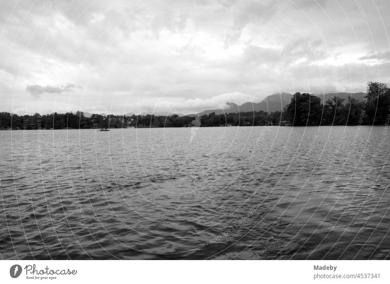 The Staffelsee during a threatening storm in Seehausen near Murnau in the district of Garmisch-Partenkirchen in Upper Bavaria, photographed in classic black and white