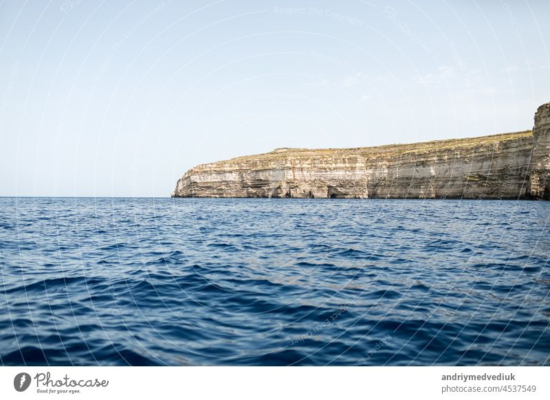 Fantastic views of rocky coast on a sunny day with blue sky. Picturesque and gorgeous scene. Malta. Europe. Mediterranean sea. Beauty world. seascape