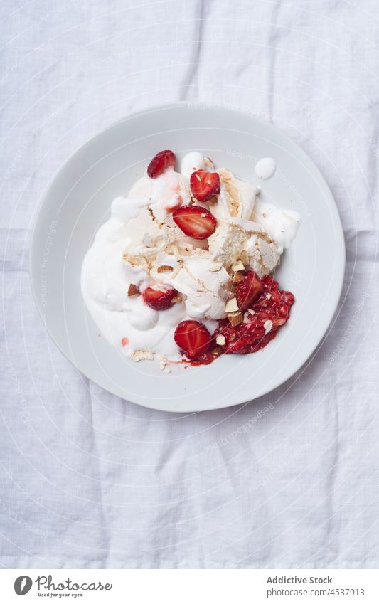 Eton mess with strawberries dessert eton mess cream sweet overhead berry food red fresh english fruit white meringue summer epicure whipped cookery top view