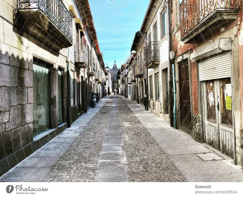 A street alley in Portugal with shops 2019-nCov Shopping street Colour photo Alley Virus pandemic