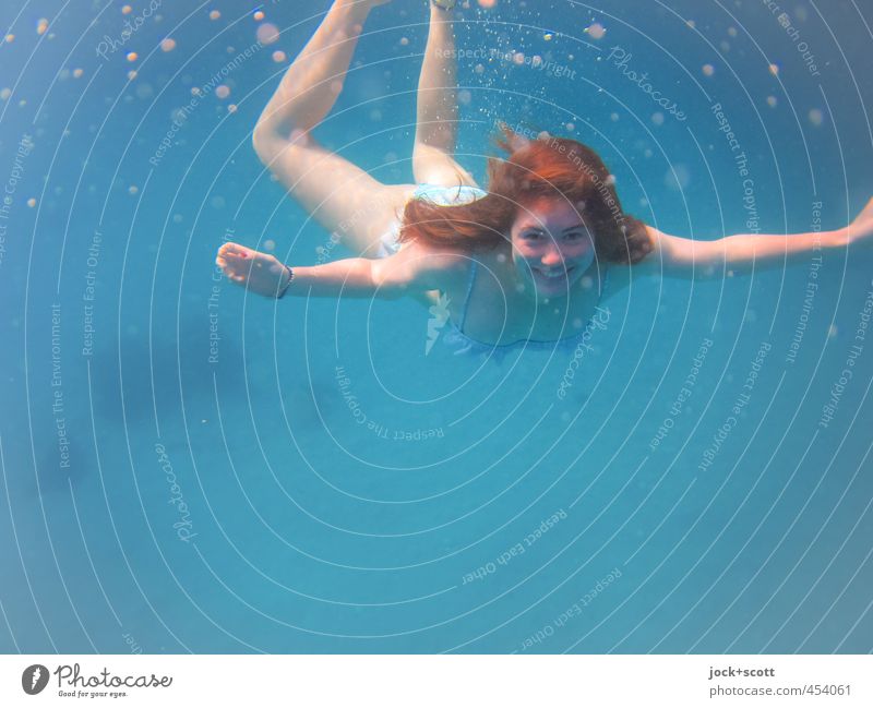 niece underwater Joy Swimming & Bathing Pacific Ocean Bikini Red-haired Long-haired Smiling Dive Free Happiness Ease Mermaid Underwater photo Neutral Background
