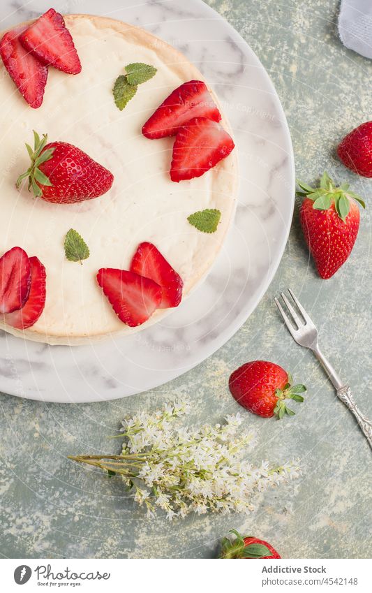 Delicious cheesecake with strawberries on plate dessert sweet strawberry decor mint baked flavor culinary homemade delicious yummy tasty appetizing ripe table