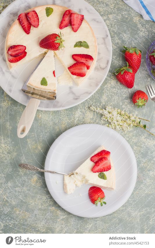 Delicious cut cheesecake with strawberries dessert sweet strawberry decor baked culinary homemade slice serve flavor mint plate delicious yummy tasty appetizing