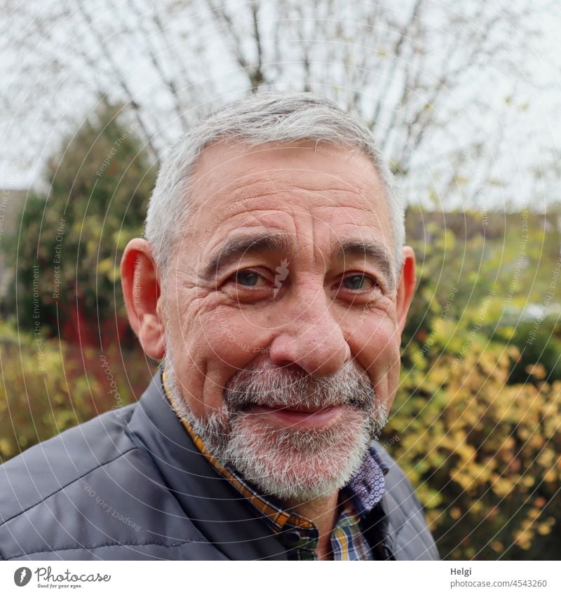 Portrait of smiling senior citizen with beard and short grey hair Human being Man Senior citizen portrait Male senior 60 years and older Masculine Adults 1