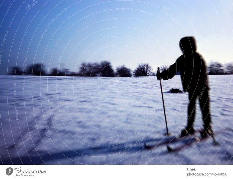 Space Glider - Hooded girl with skis on snowy meadow in evening light Girl Skiing Winter sports Snow Meadow Horizon Anorak Hooded (clothing) Ski pole Movement