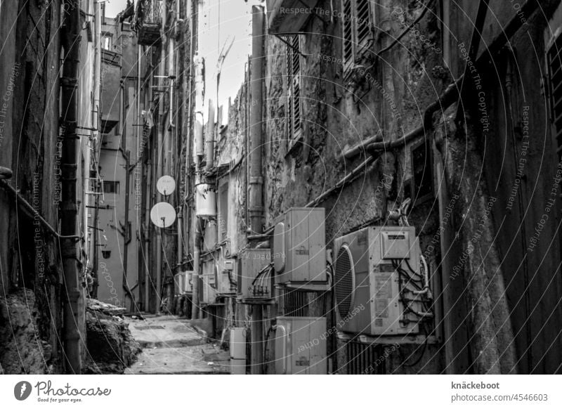 air-conditioned dystopic Dark Air conditioning Shadow Sidestreet Deserted Town Wall (building) Alley Black & white photo Southern Europe Corsica Old town