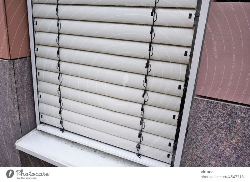 closed window blinds in the outside view / privacy screen Venetian blinds Window blinds Closed roller shutter pleated House (Residential Structure) Building