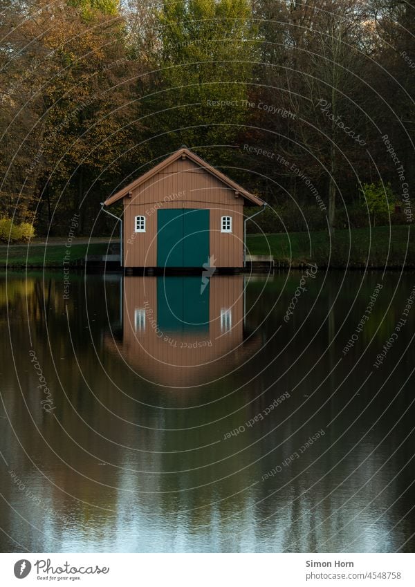 Cottage on the water Boathouse pond Lake Hut Lakeside Calm Reflection Water Surface Surface of water Environment Idyll Nature Water reflection Peaceful Pond