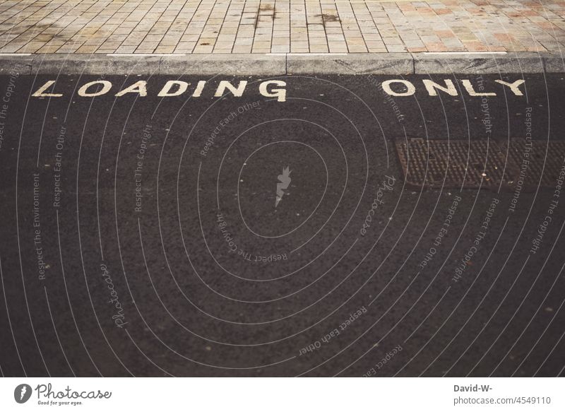 loading only - road - load only here Street Americas Clearway Clue Road marking Road traffic Curbside
