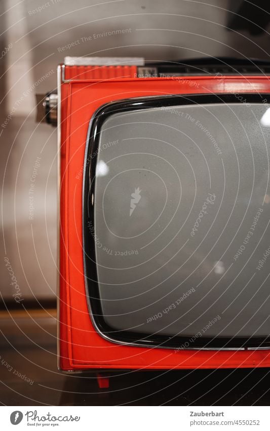 Red television with picture tube from the 70s with plastic housing TV set Plastic Screen 1970s Television Media Entertainment electronics Retro Technology