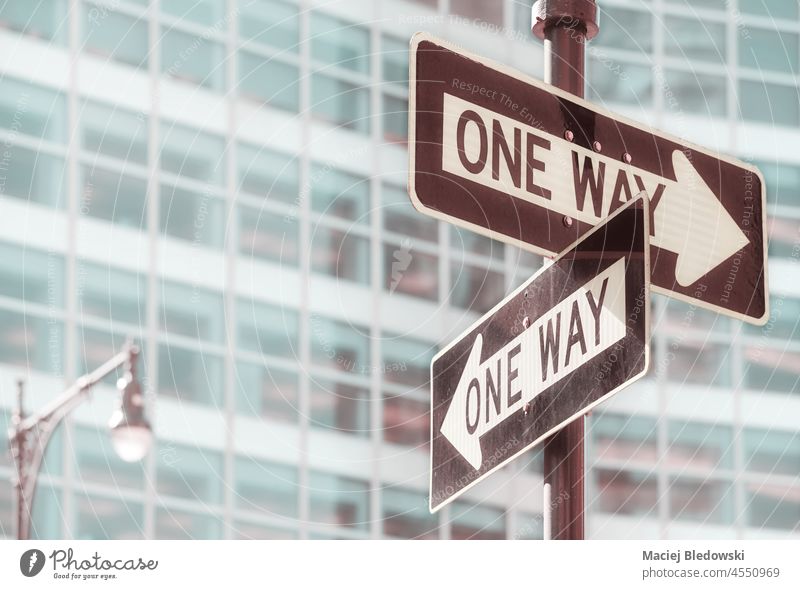 One Way road signs in New York City, selective focus, color toning applied, USA. city one way choice alternative decision Manhattan street direction traffic