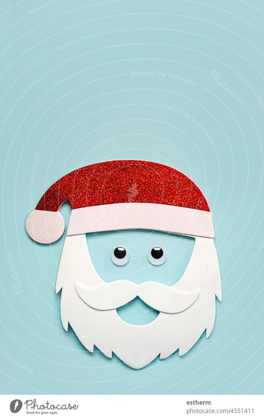 Merry Christmas. Santa claus mask with false eyes and copy space. Christmas concept background christmas santa claus fun celebration christmas present