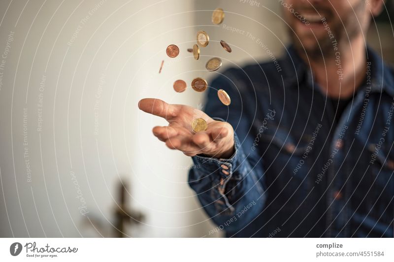 A man throws coins in the air Money Coins Euro Income Economy Financial institution Game of chance Squander Throw Euro symbol Hand Success Business