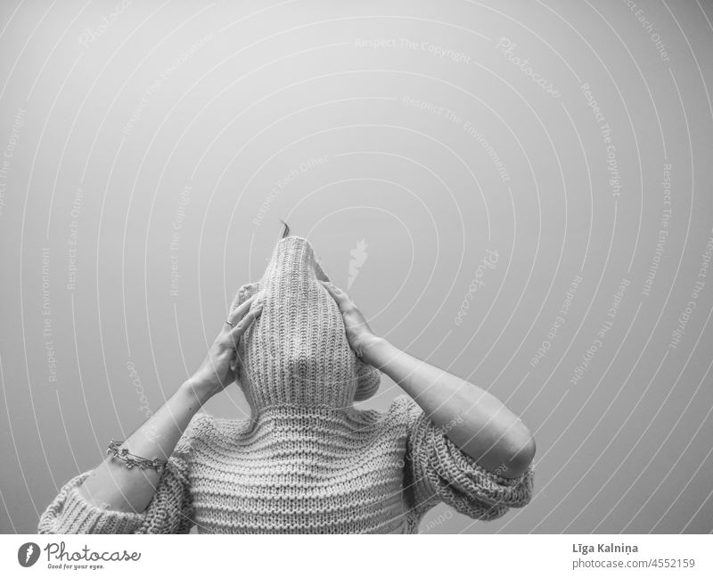 Anonymous woman in oversized sweater holding her head Sweater Wool sweater Knitted sweater Woman Warmth Human being Interior shot Soft Winter Fashion Cozy
