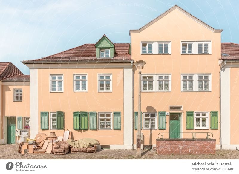 Apartment building in warm colour scheme House (Residential Structure) Deserted Magdeburg Modernity Window Colour photo Exterior shot Manmade structures pastel