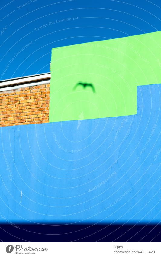 in south africa close up of the blur color  wall house background abstract blue sky texture building design pattern architecture vintage modern old colorful