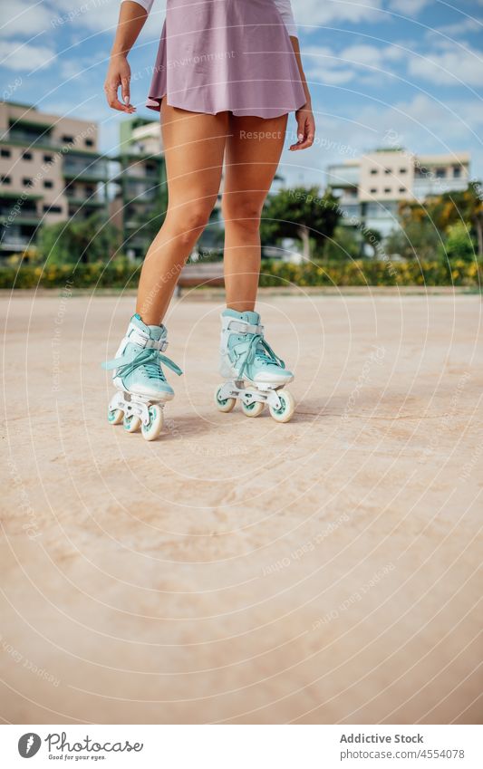 Unrecognizable roller skater on street woman sportive hobby sidewalk training activity healthy lifestyle wellbeing female fit workout summer pavement wellness