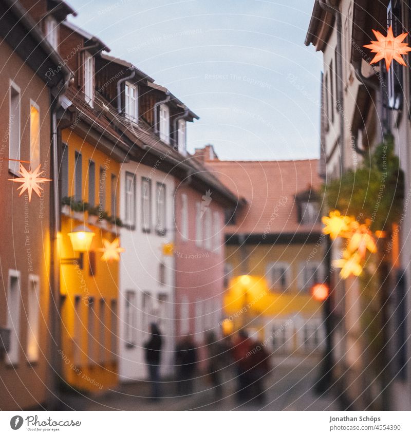 Alley with poinsettias in Erfurt Shallow depth of field Light Twilight Deserted Exterior shot Tilt-Shift Peace Evening Lantern Thuringia Tradition Colour photo