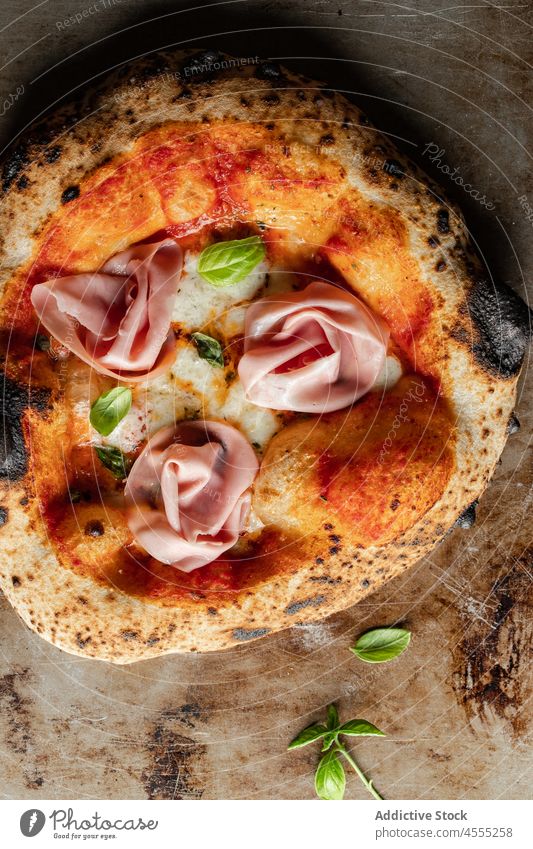 Pizza with ham and cheese and basil pizza food appetizing yummy tasty delicious whole italian burn fast food cuisine culinary nutrition delectable dough menu