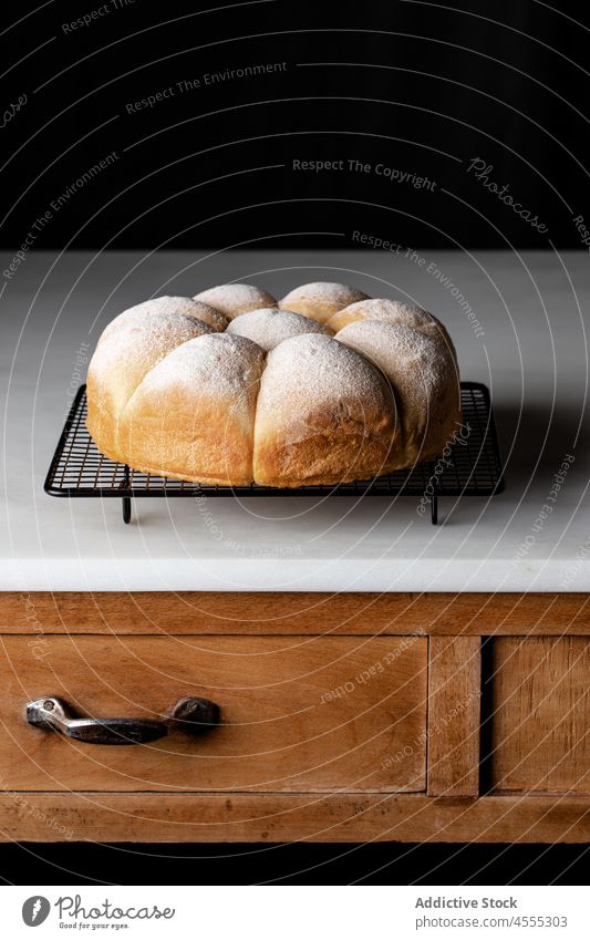 Bread buns on grill pan in dark kitchen bread tasty baked delicious food appetizing tray counter yummy nutrition palatable delectable cabinet fresh nutrient