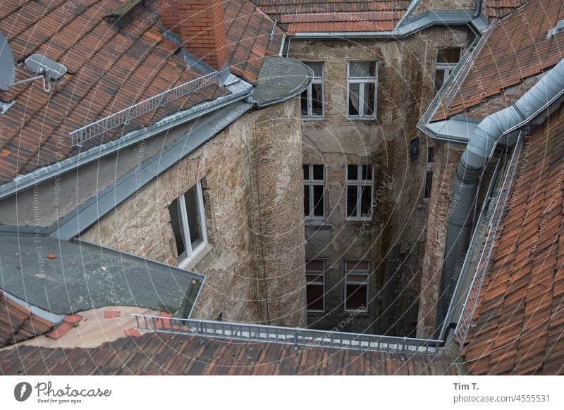 View from above in a Berlin backyard Backyard Middle Interior courtyard House (Residential Structure) Window Facade Town Deserted Living or residing