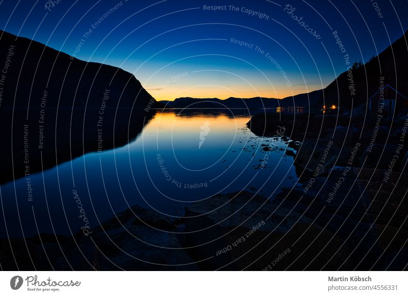 Fishing vacation in Selje Norway. the blue hour on the fjord. mountain water calm nature view vibrant color dark tranquil scene inspiration pretty meditation